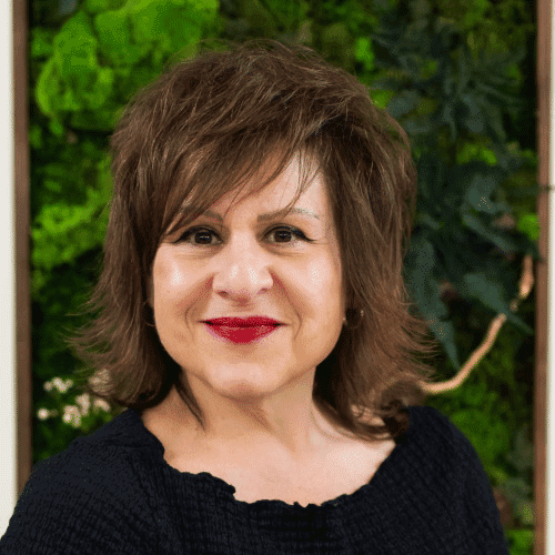 Portrait of Angie Iorio, a professional stylist at Salon Felice Uptown, showcasing their expertise and style.